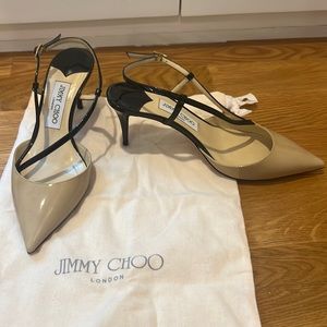 NWOT Jimmy Choo tan and black patent leather sling back heel. Perfect condition.